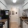 a kitchen with white cabinets