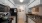 a kitchen with white cabinets