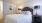 a bed with a white bed spread