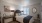a bedroom with a bed and a mirror